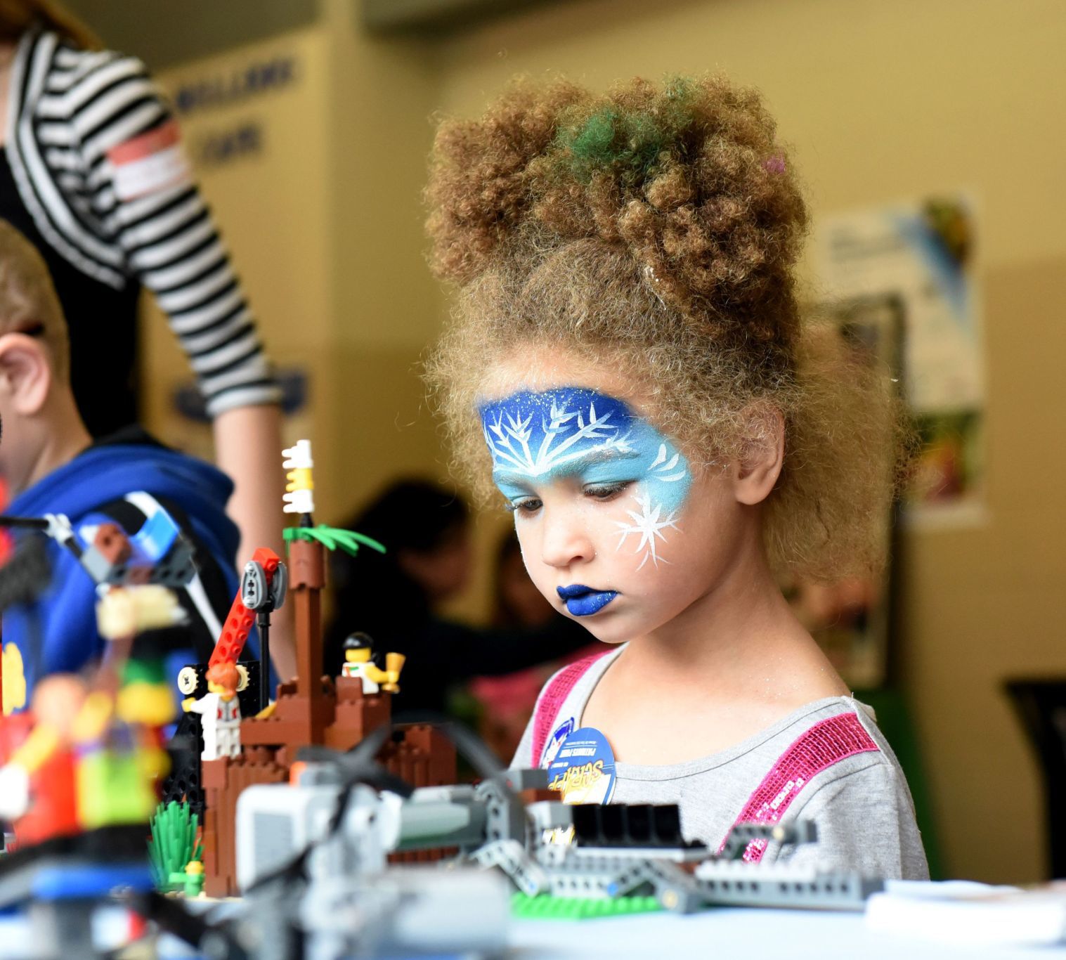 KidsFair girl with facepaint and LEGOs